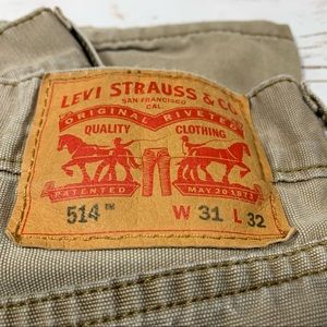 Levi’s 514 tan 31x32 slim straight distressed 5 pocket Jean style 1401